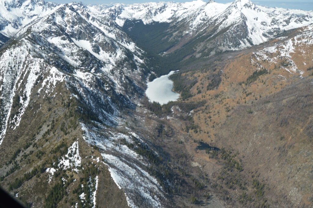 Aerial photo of Eight Mile Lake situated in the mountains