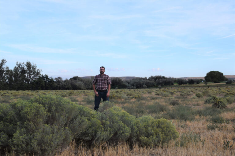 Photo of Clancy Flynn standing in a field