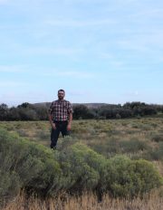 Photo of Clancy Flynn standing in a field